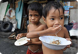 Kids eating a meal outdoors